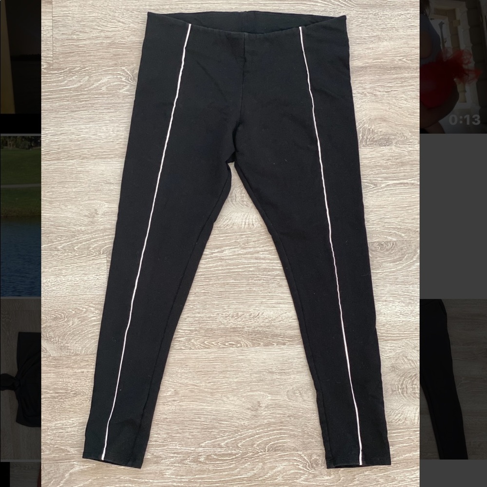 Black leggings with white stripe